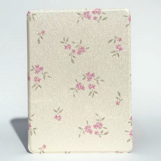 Blooming ditsy floral Kindle case standing upright, pink blossoms on pearly ivory, Case Society Co