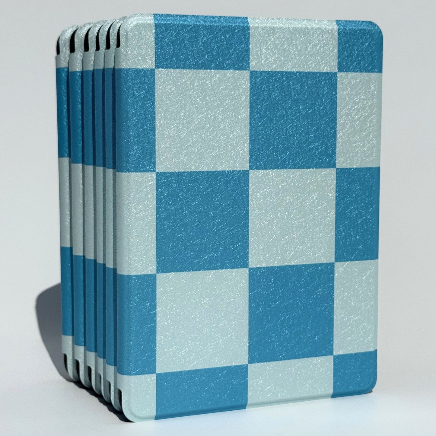 Blue gingham Kindle Paperwhite case standing upright, shipped from our Australian shop