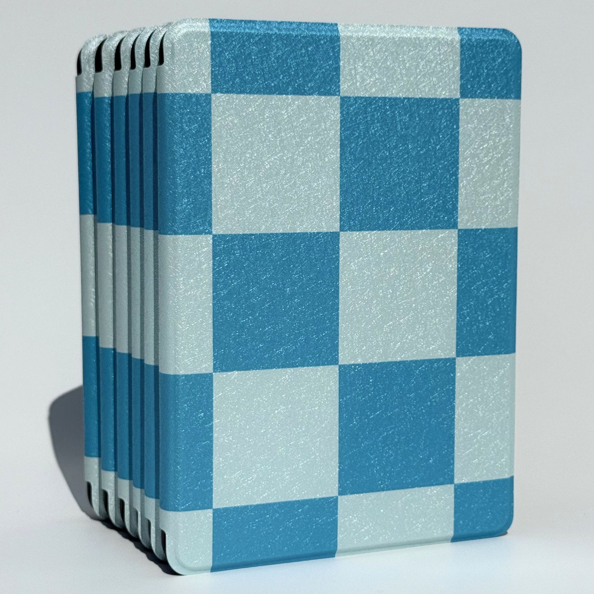 Blue gingham Kindle Paperwhite case standing upright, shipped from our Australian shop