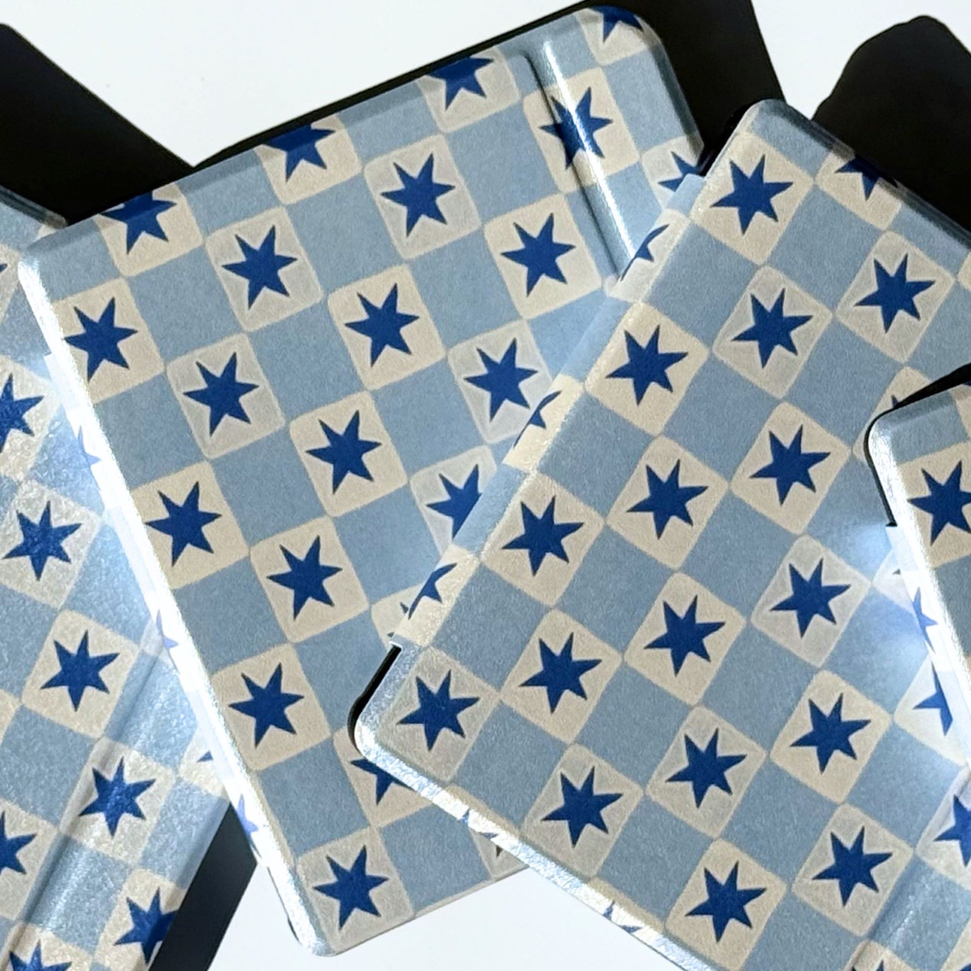Blue star check Kobo Libra cases stacked on their sides