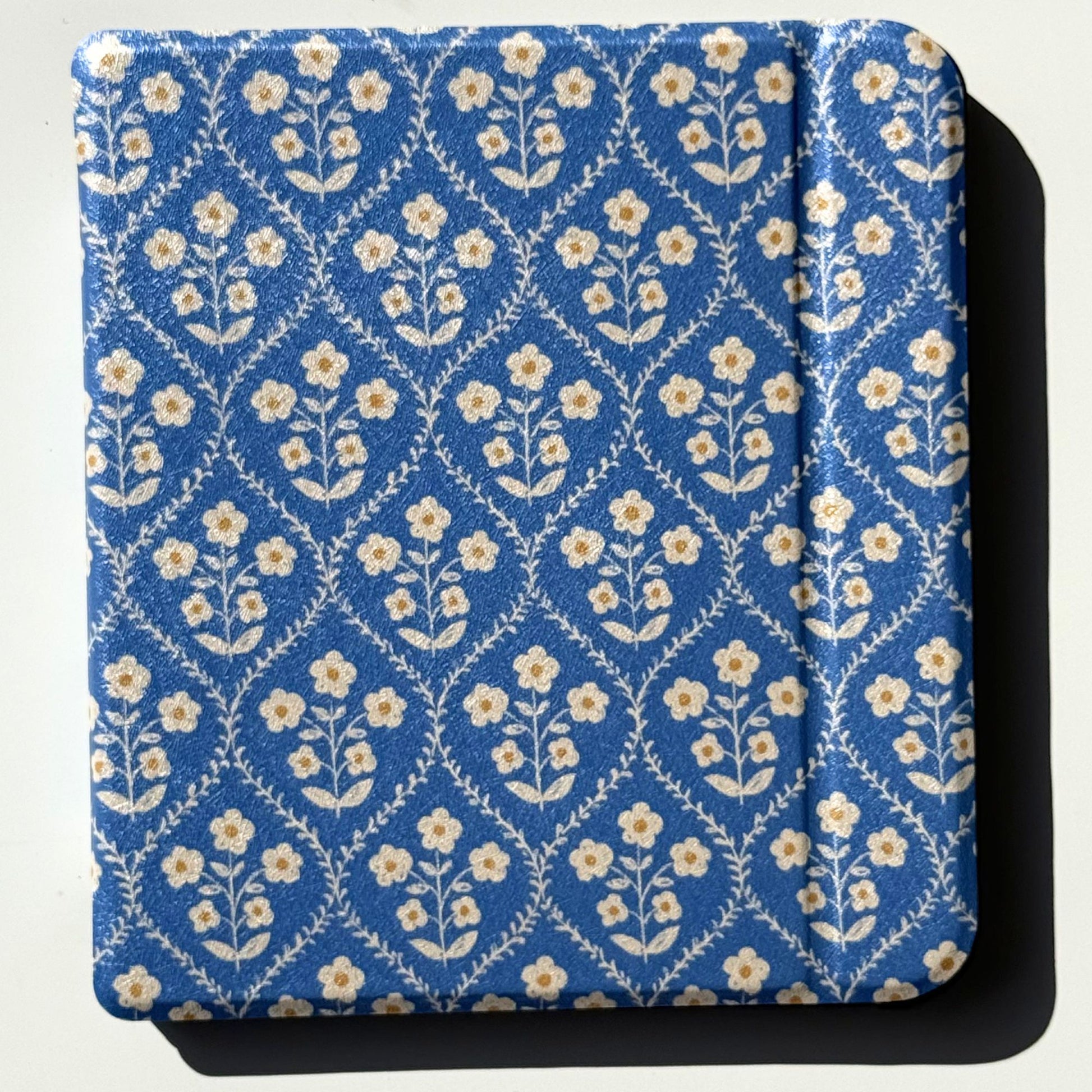 Bluebell blue floral Kobo case, cream flowers on a cornflower-blue trellis, front view