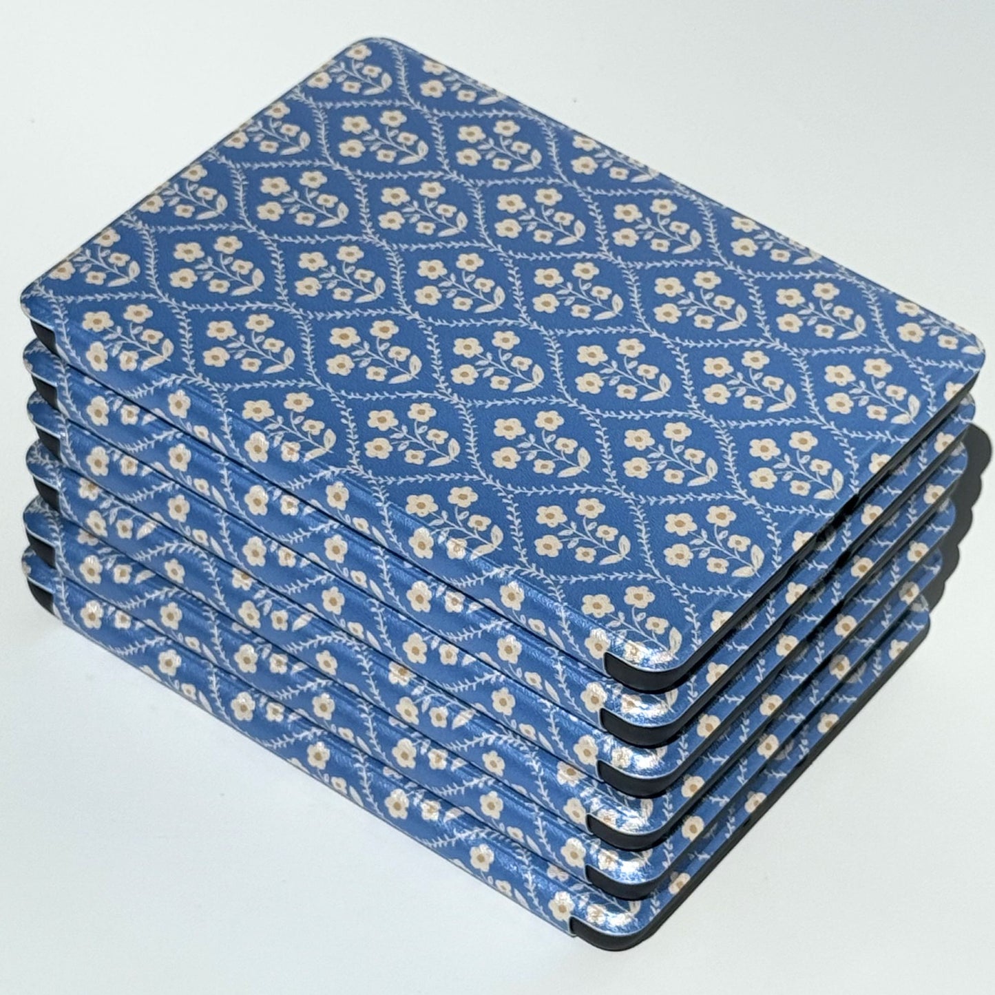 Side stack of Bluebell blue floral Kindle cases highlighting the slim, lightweight build — Case Society AU