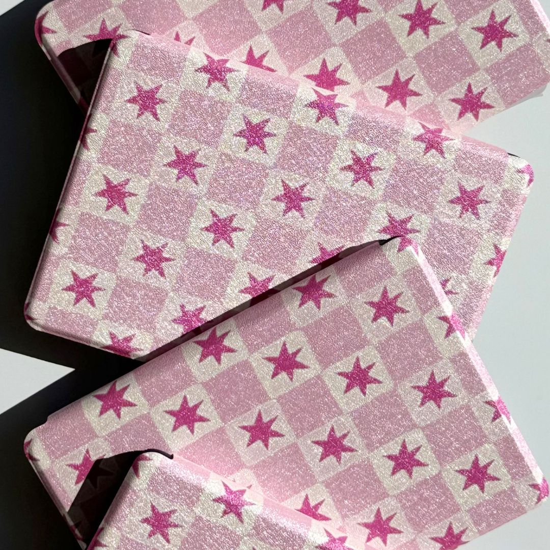 Blush Cosmos Kindle case in pink star checkered design overlapping at angles — Case Society Australia