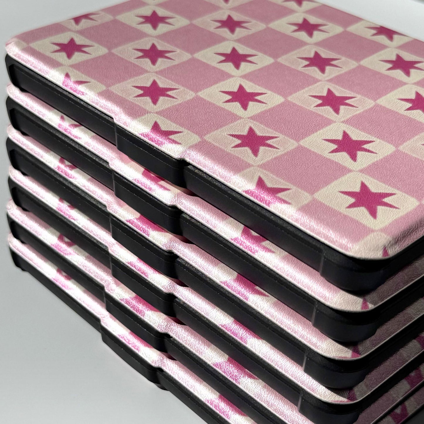 Close-up of the pink star check on a Blush Cosmos Kobo Clara case, Case Society Co