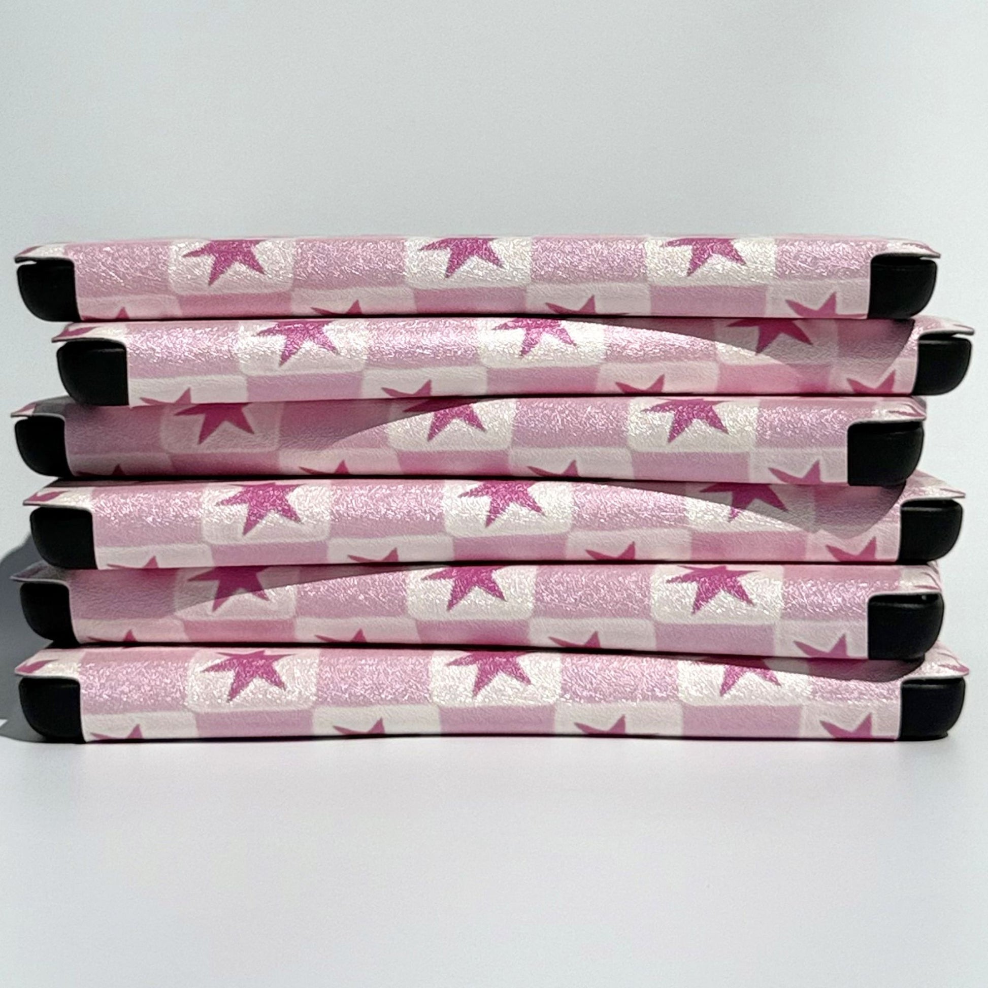 Pink star check Kobo Clara cases stacked on their sides, shipped from Australia