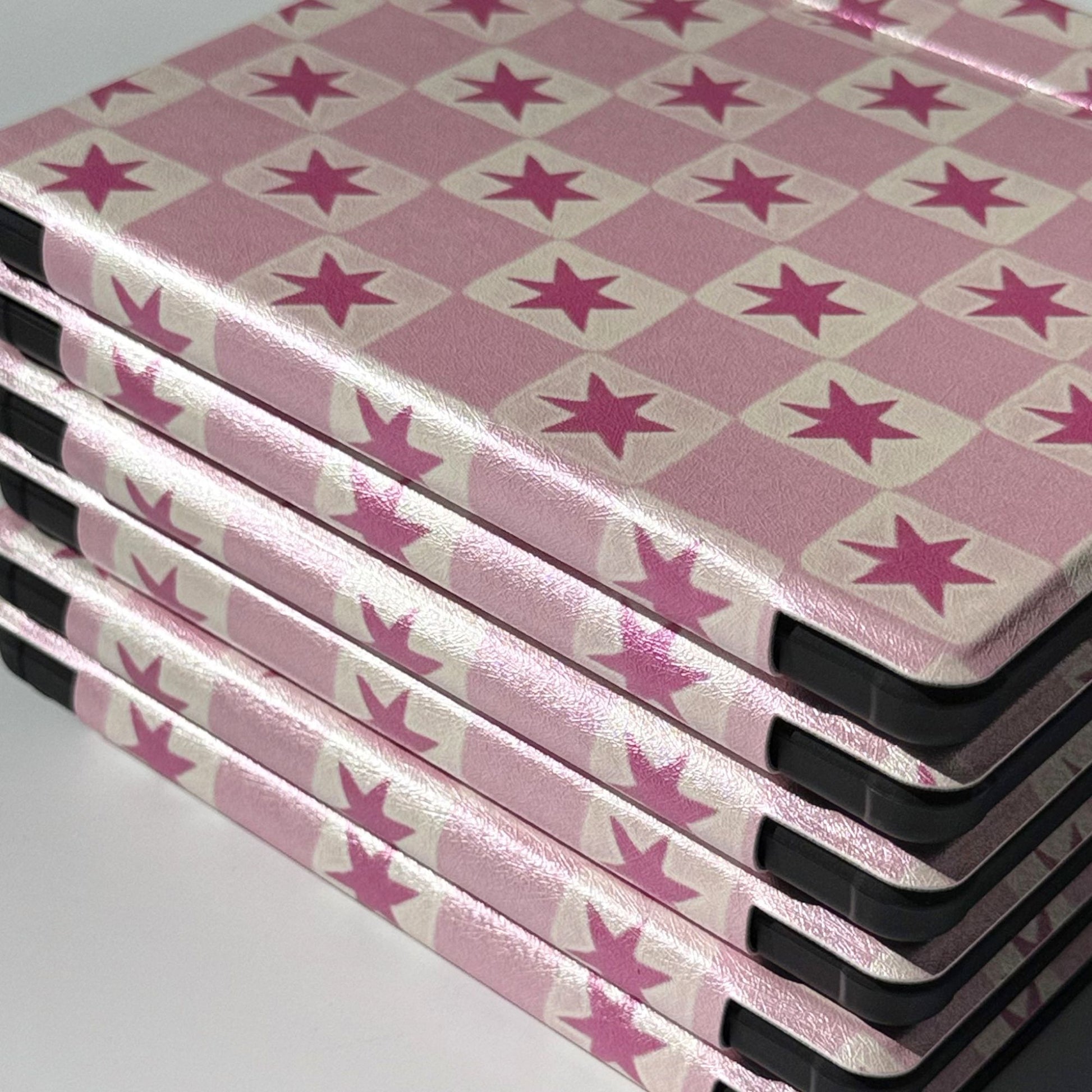 Pink star check Kobo Libra cases stacked on their sides, Case Society Co