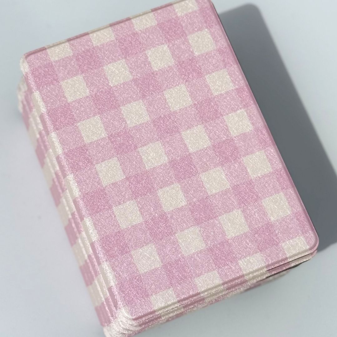 Pink gingham Blush Lover Kindle cases overlapping showing soft coquette pattern detail