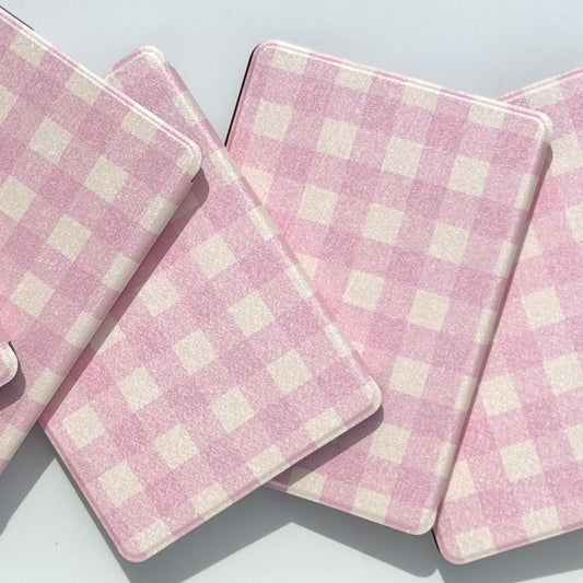 Blush Lover Kindle case in soft pink and white gingham scattered at angles — Case Society Australia