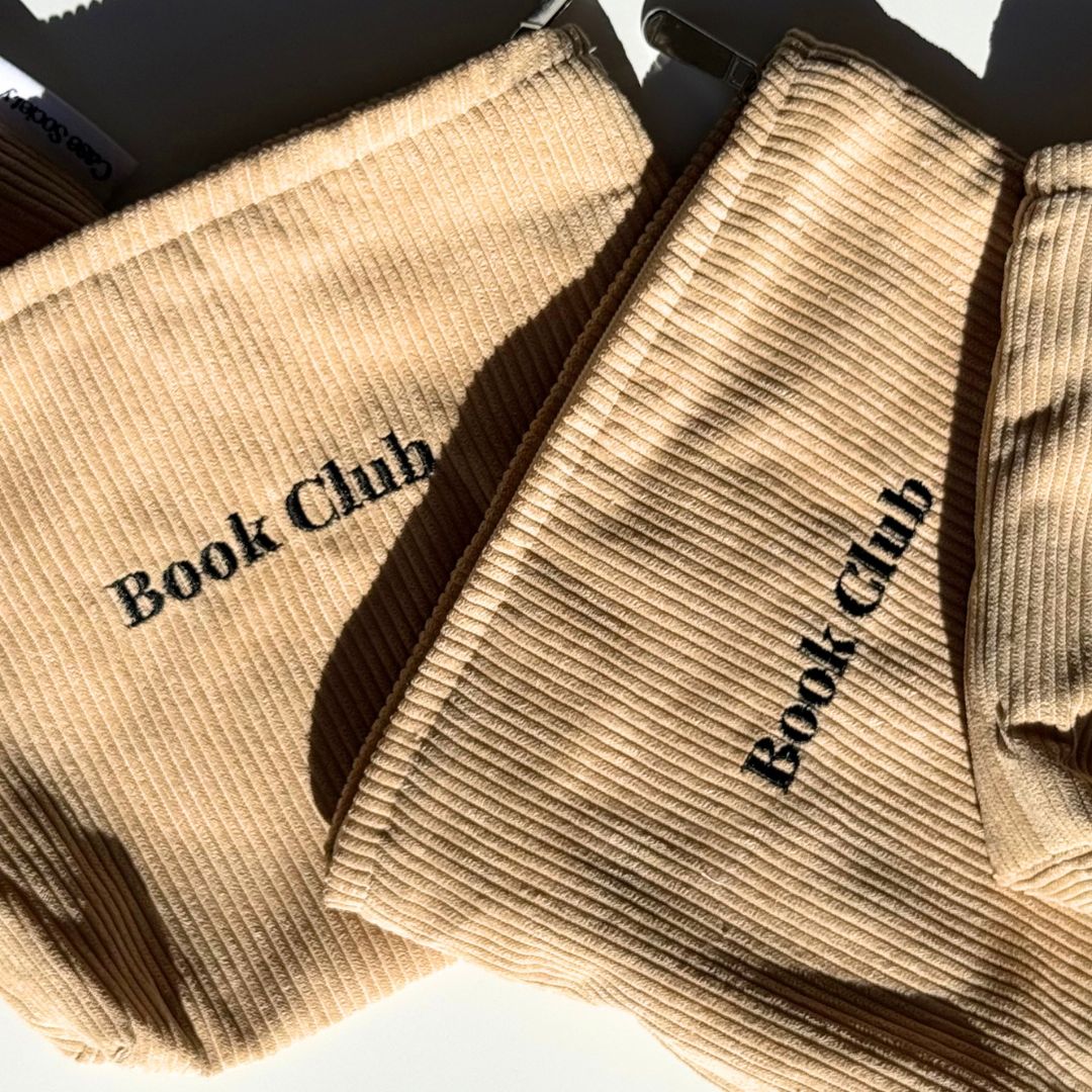Pair of honey Book Club kindle sleeves side by side with silver zips, shipped from our Australian shop