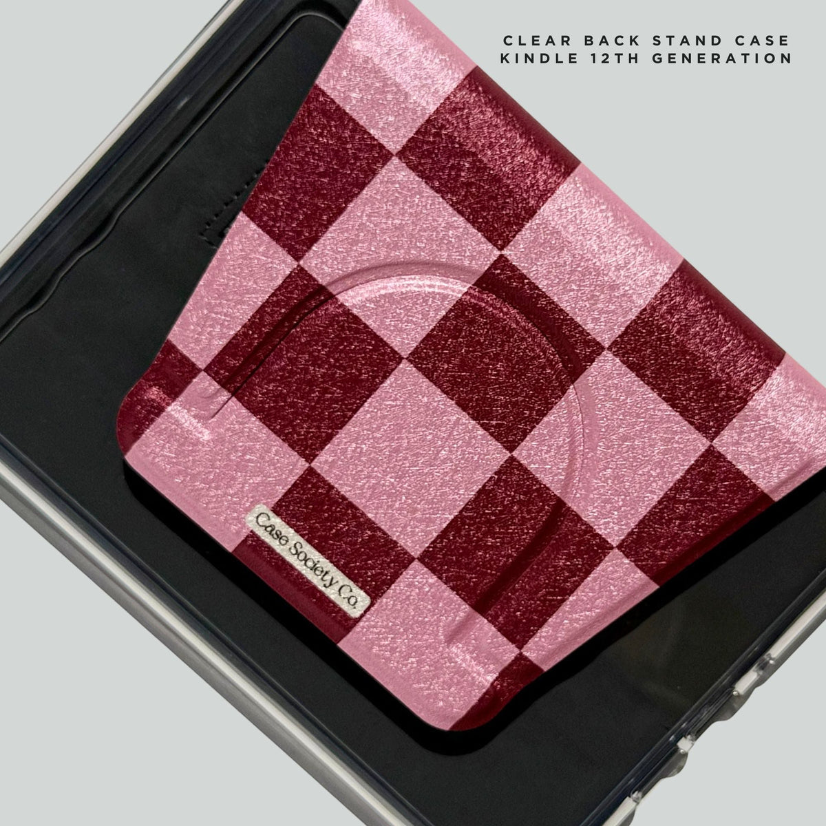 Bordeaux Fiction design showing through the clear back stand case for Kindle 12th Gen