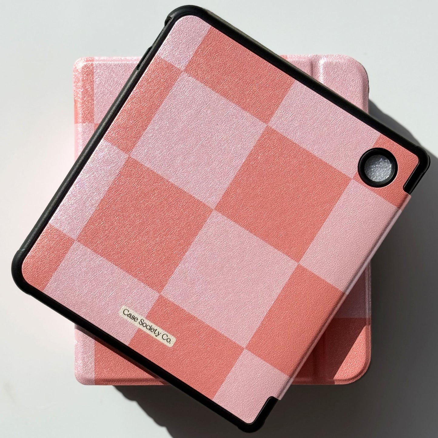 Front view of Fairy Tales Kobo Libra case in coral and pink checkerboard — romantic coquette bookish ereader cover from Case Society Co.