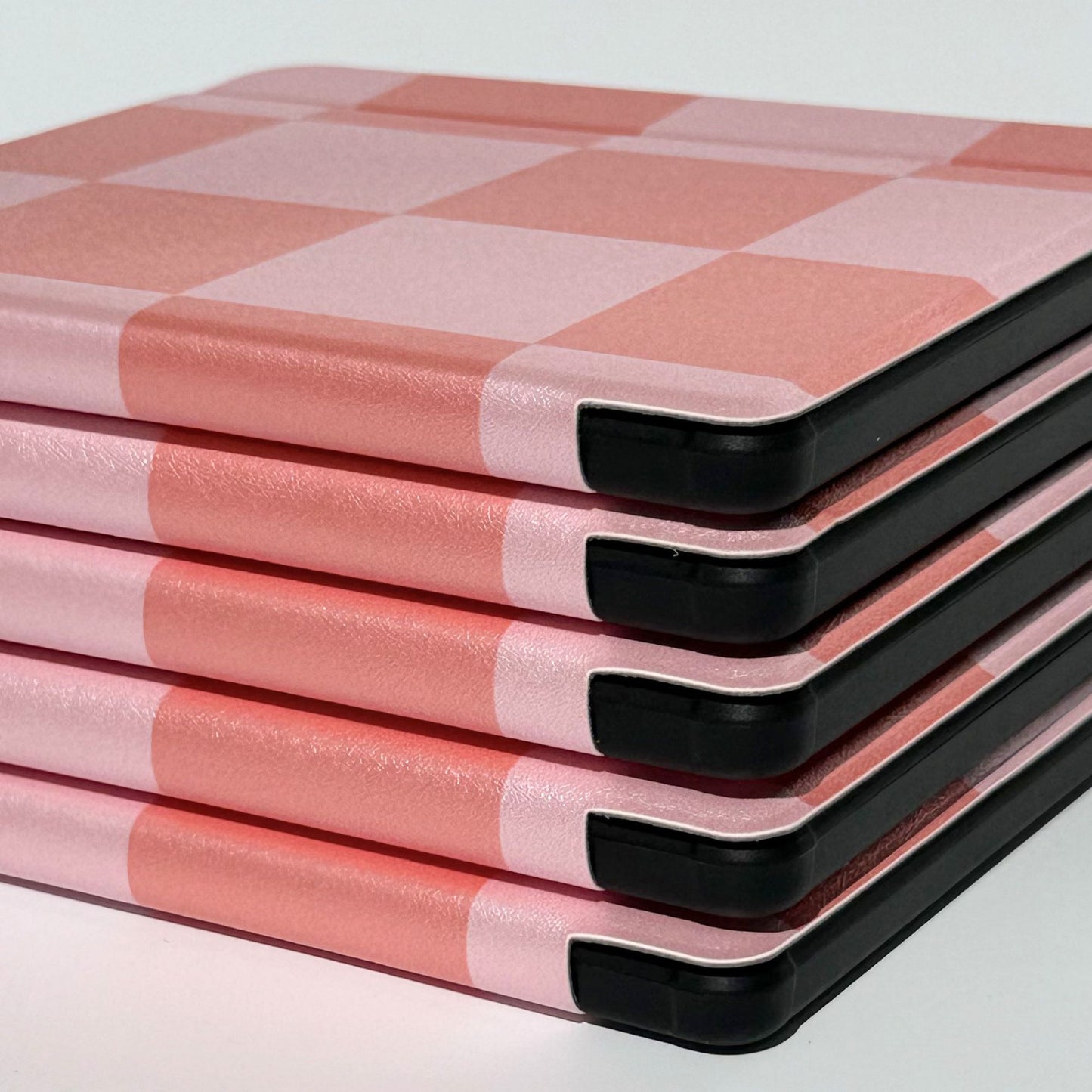 Back of Fairy Tales Kobo Libra case showing precise camera cutout, black shockproof bumper and Case Society Co. logo on coral pink check print