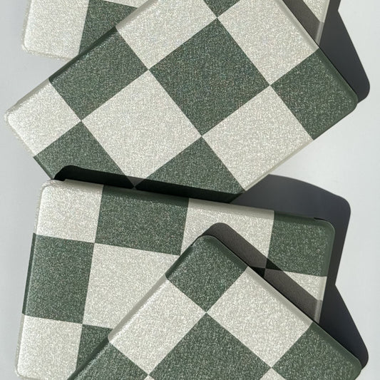 Forest Lore green and cream checkered Kindle cases overlapping to show the checkerboard print — Case Society Co Australia
