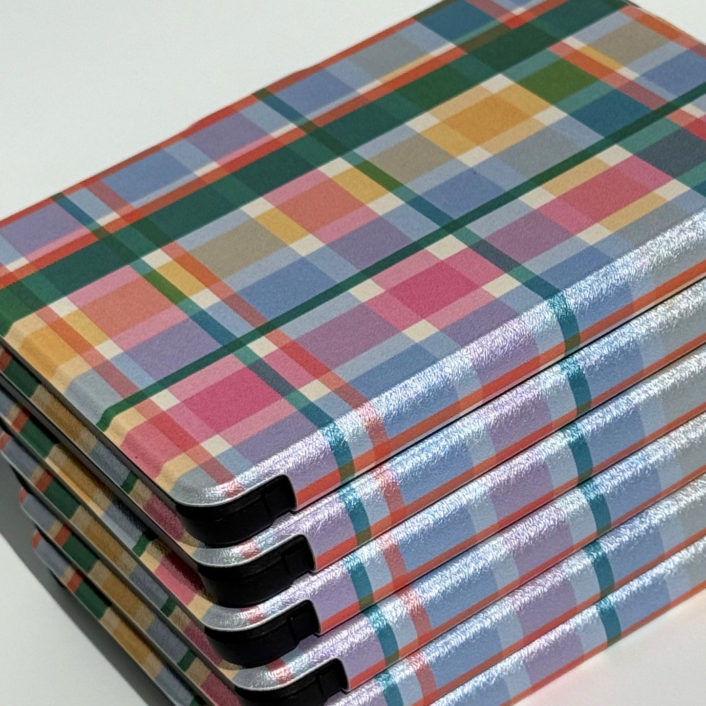 Protective Kobo cover with multicolor check design.