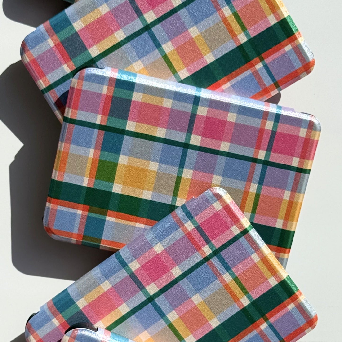 Side view of plaid Kobo cover with colorful check pattern.