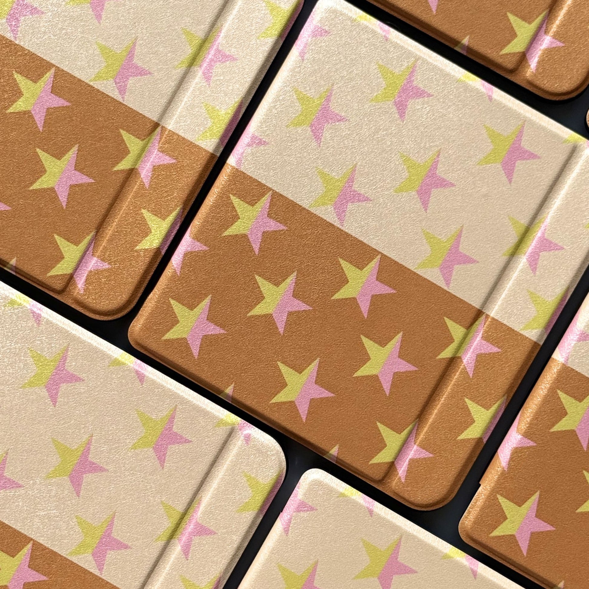 Upright Stardream Kobo case with pink stars.
