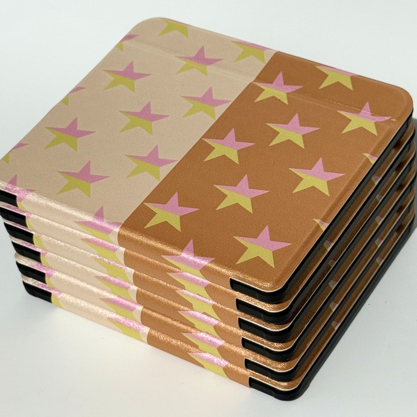 Close-up of pink and gold star Kobo cover.
