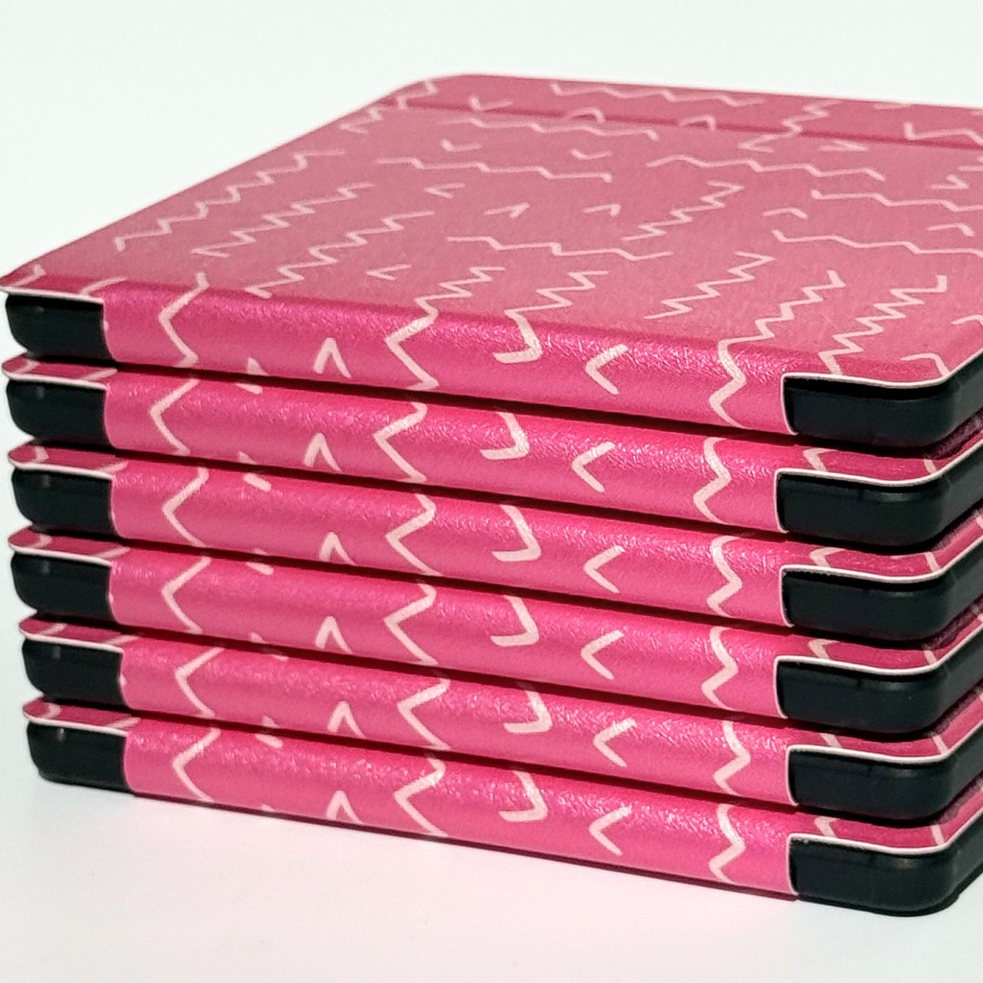 Top angle view of Literary Lines Kobo Libra cases — hot pink bookish ereader cover with abstract line print