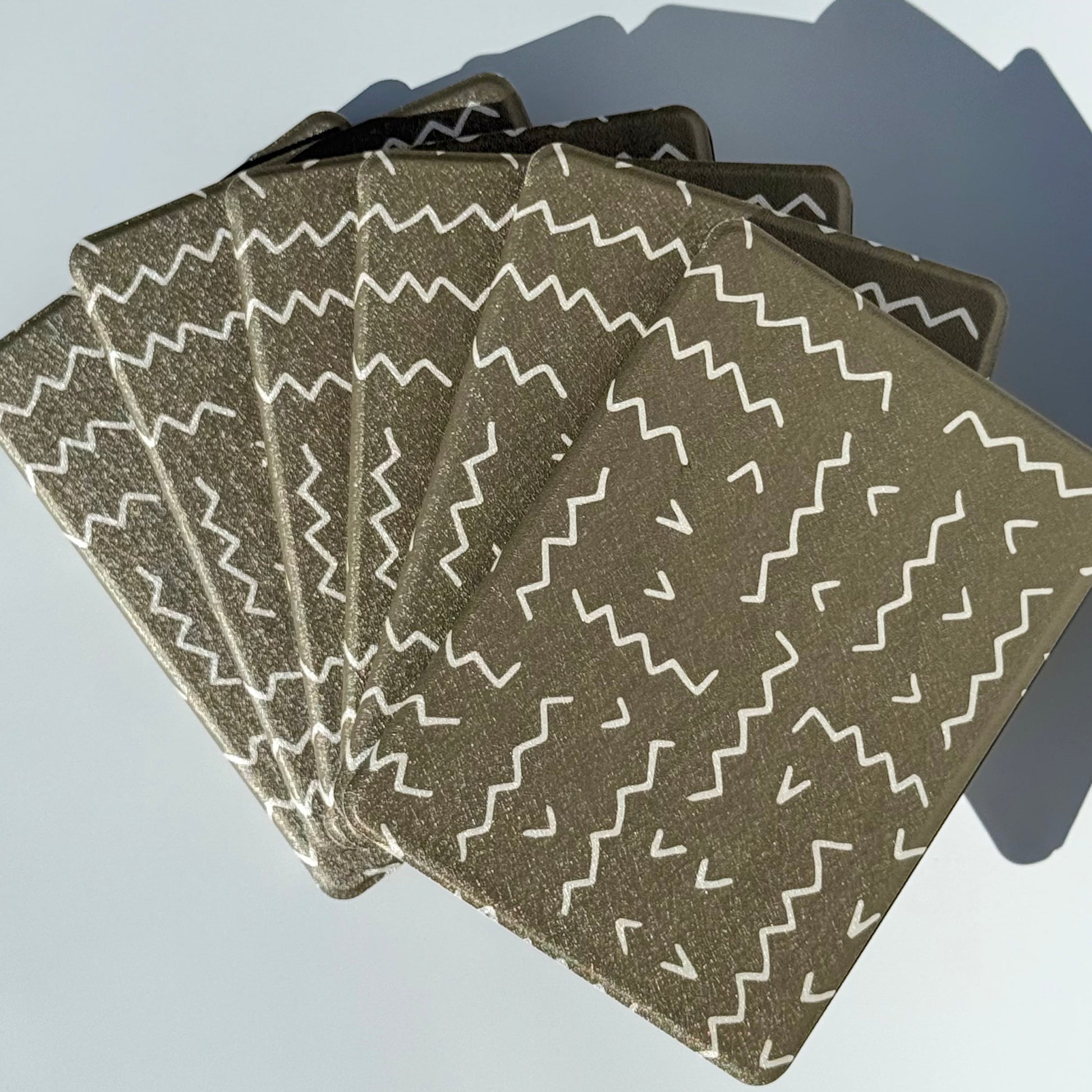 Off Script olive and cream zigzag Kindle case with hand strap and magnets