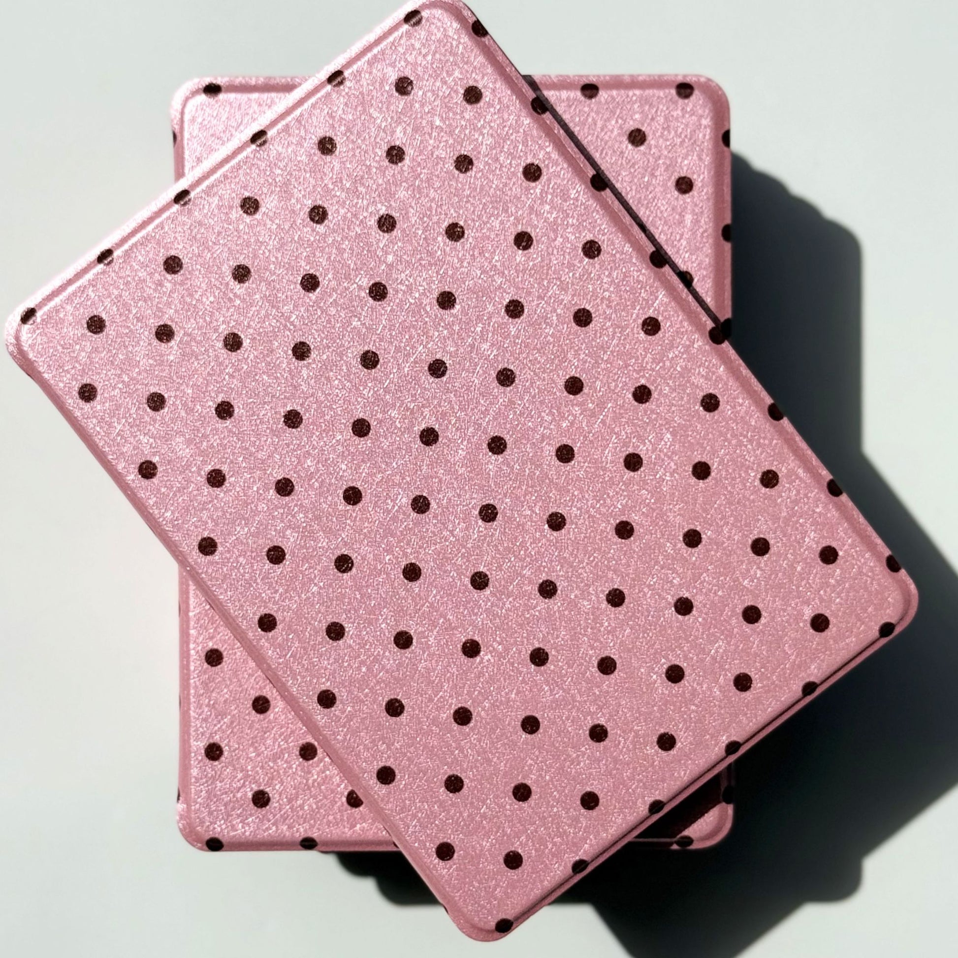 Two Pink Reverie polka dot Kindle cases flat lay from above, aesthetic pink Kindle case Australia