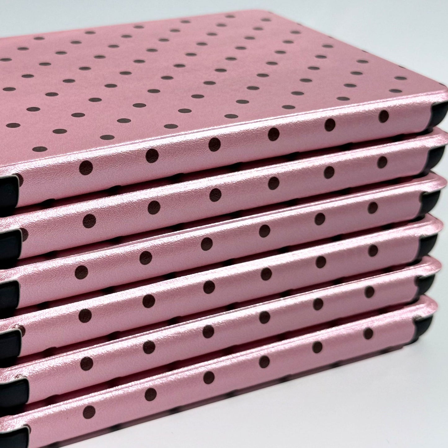 Pink Reverie Kindle case stack showing shockproof black corner bumpers