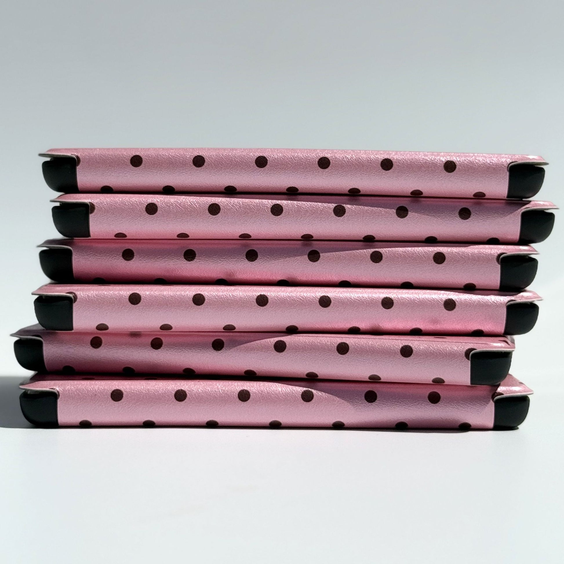 Pink Reverie Kindle case side view showing lightweight folio profile