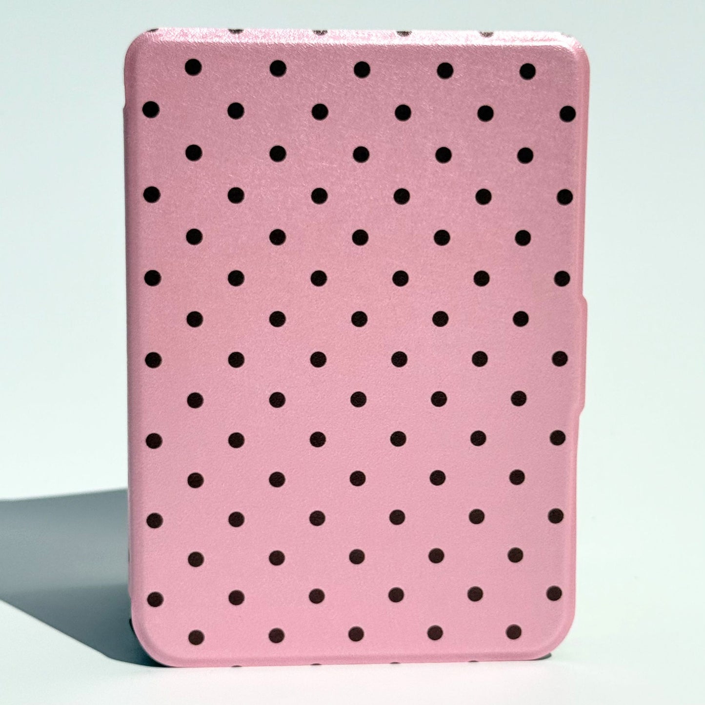 Pink Reverie Kobo Clara case standing upright, blush pink polka dot cover