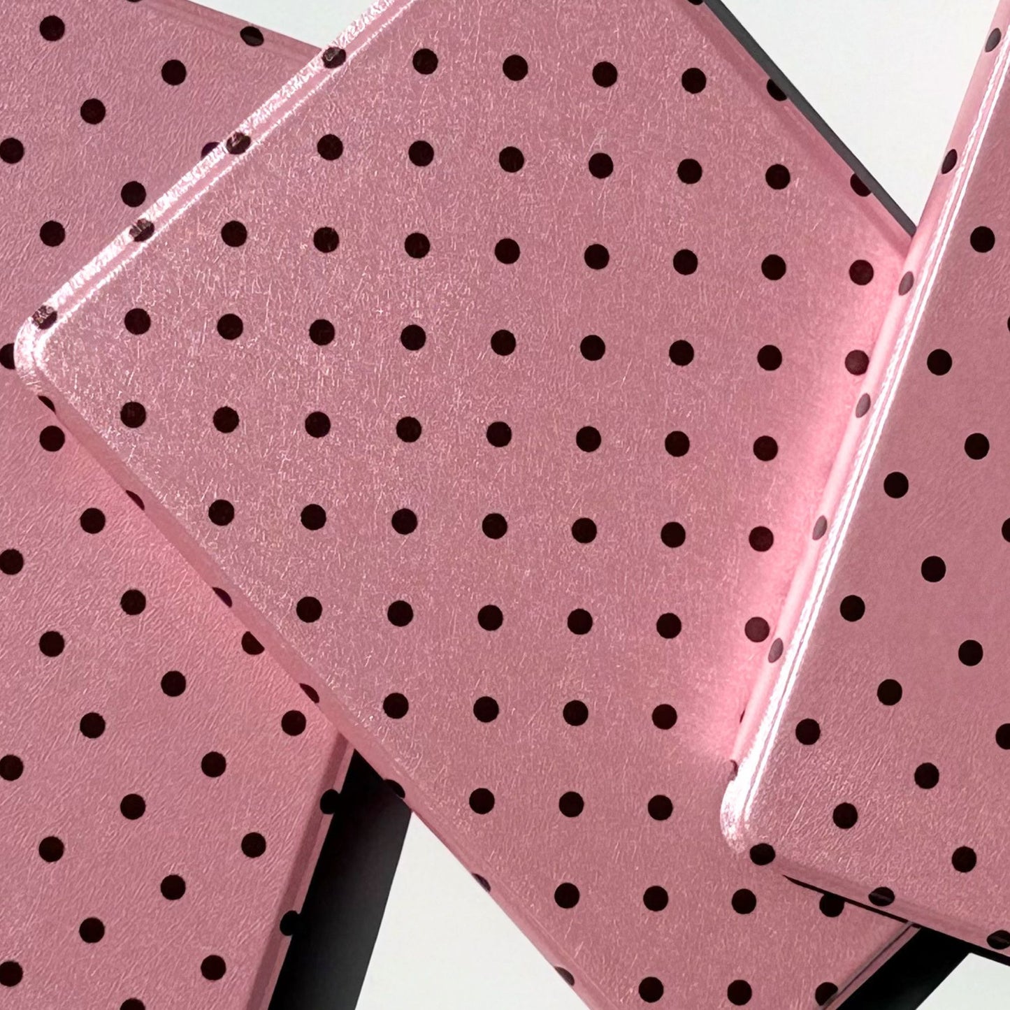 Close up of Pink Reverie Kobo Clara case, dark polka dots on blush pink
