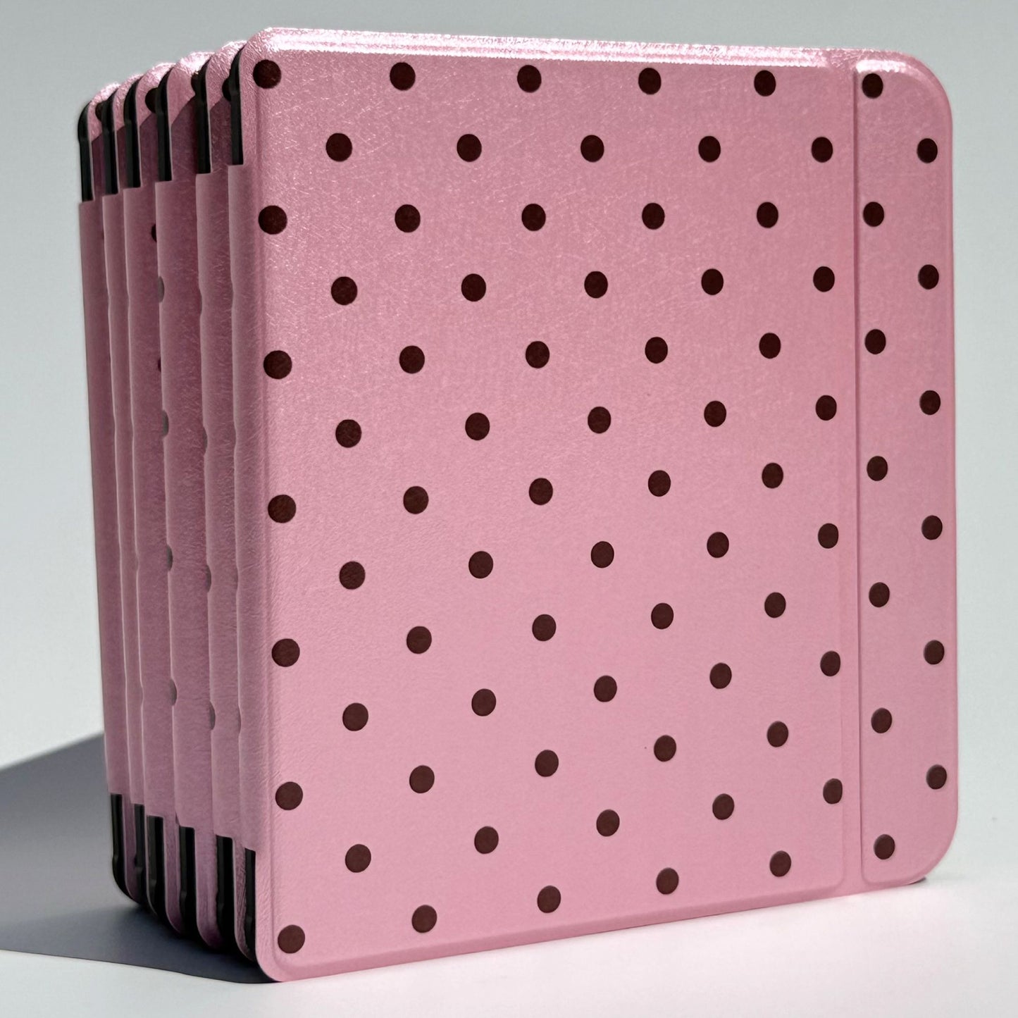 Side stack of Pink Reverie Kobo Libra cases, slim protective pink polka dot folio