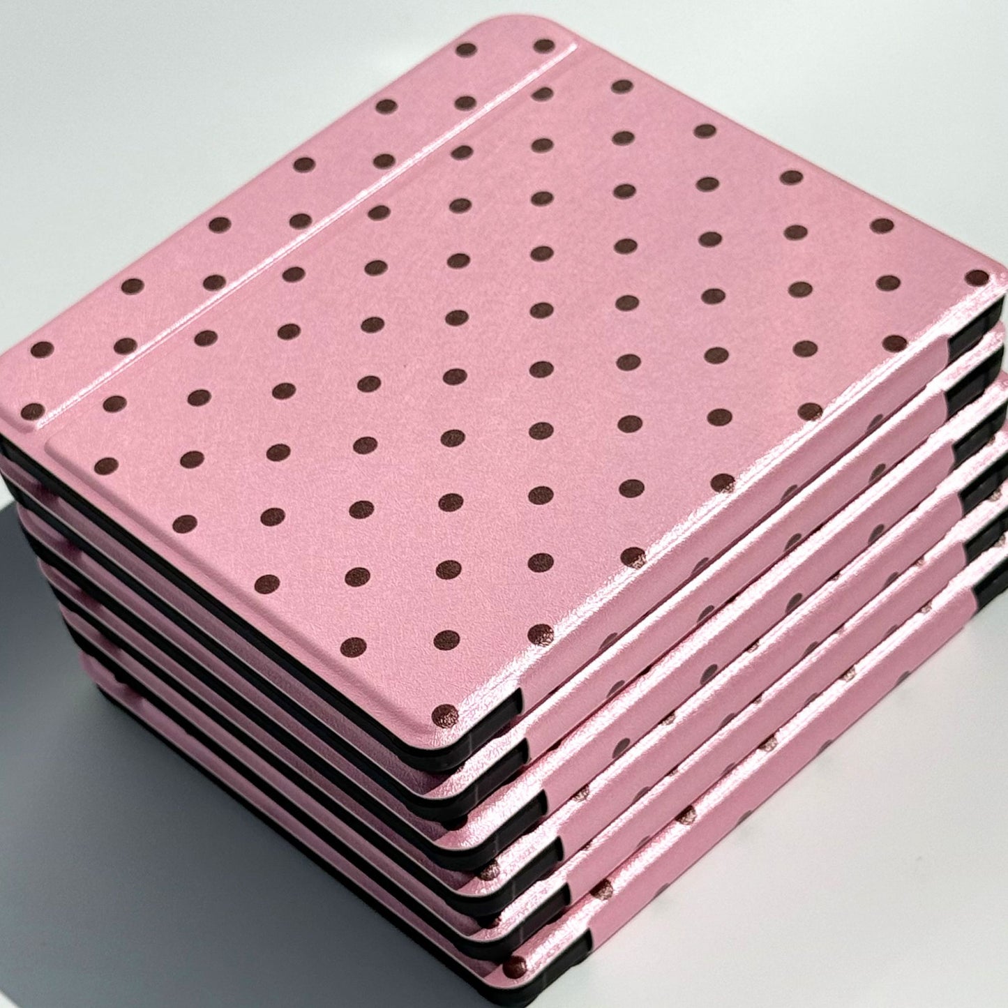 Pink Reverie Kobo Libra pink polka dot cases, top down angled view