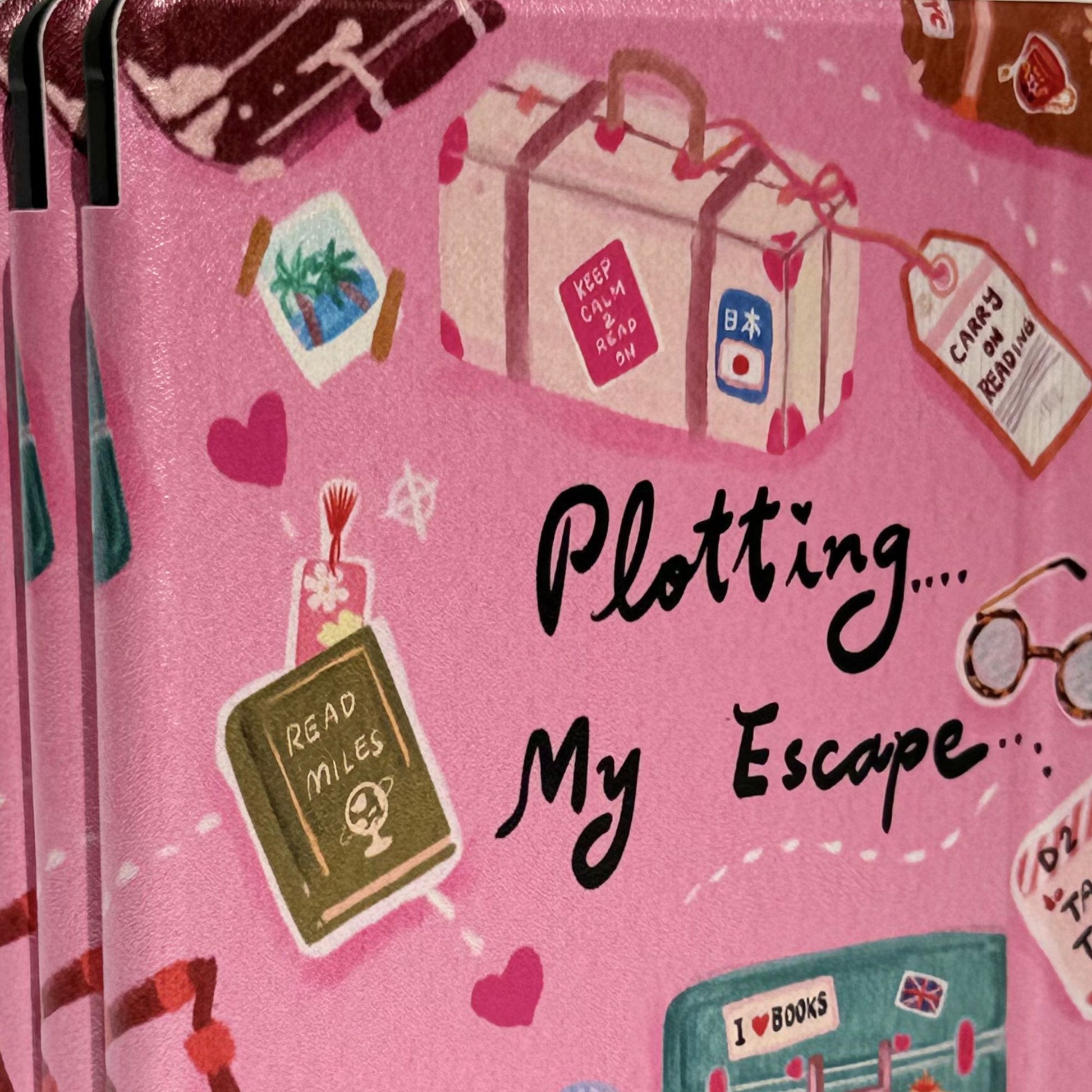 Angled view of Plotting My Escape Kobo Libra case showing travel and reading themed cover design in pink