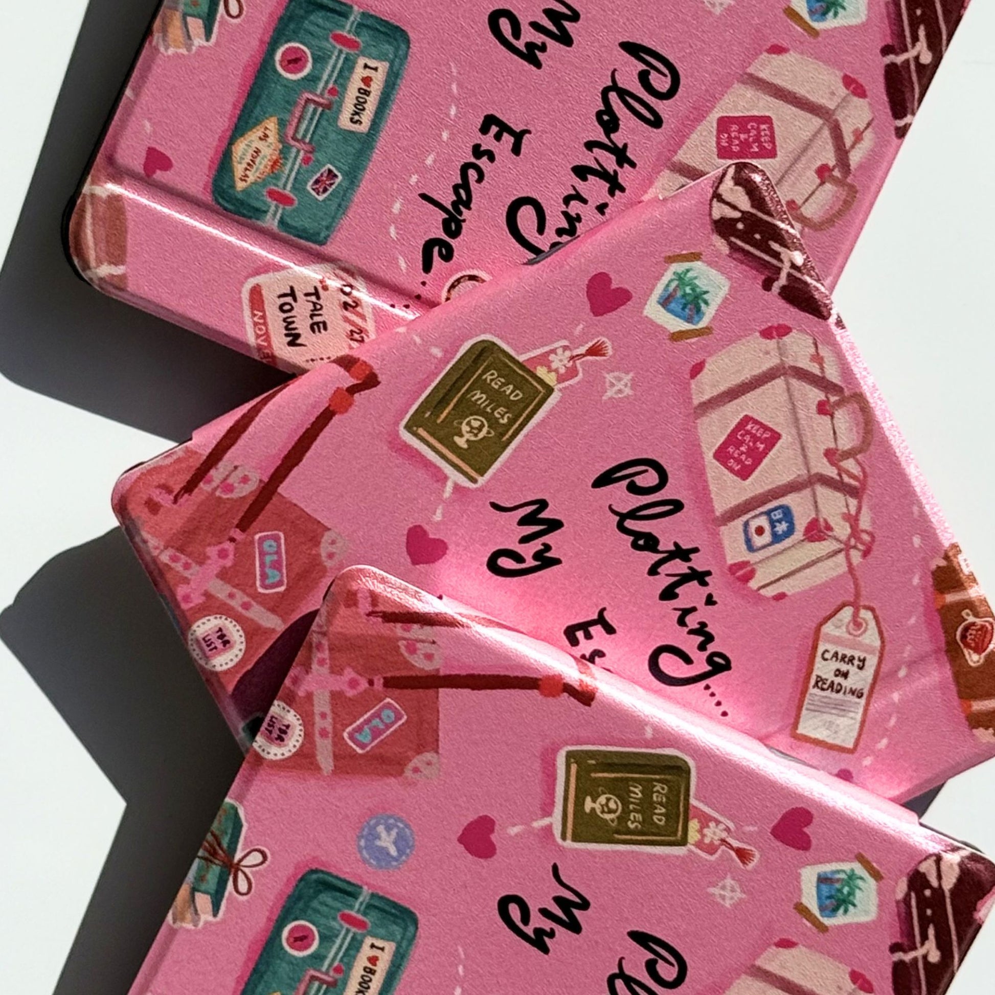Multiple Plotting My Escape Kobo Libra cases stacked -  perfect bookworm gift for readers in Australia and worldwide