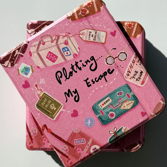 Pink Plotting My Escape Kobo Libra case with bookish suitcase design, top view of stacked covers  - Case Society Co. Australia