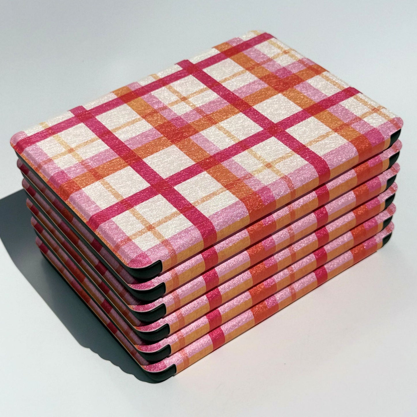 Pink and orange plaid Kindle case in the Roseline design, front view