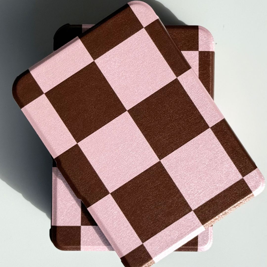 She's Checked In Kobo Clara case, pink and brown checkerboard front view