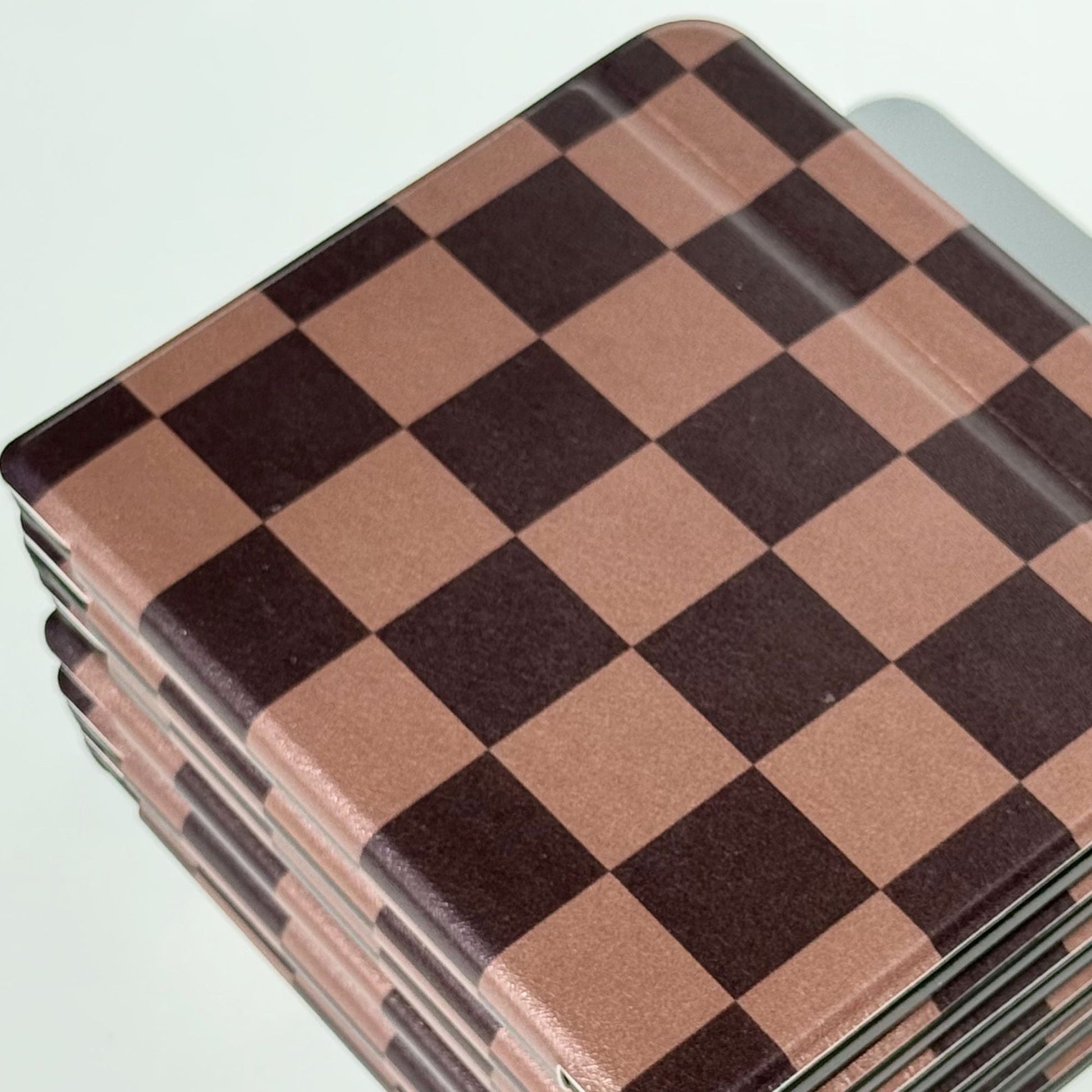 The Dreamer Kobo Libra case front view in brown and tan checkerboard print — minimalist bookish ereader cover