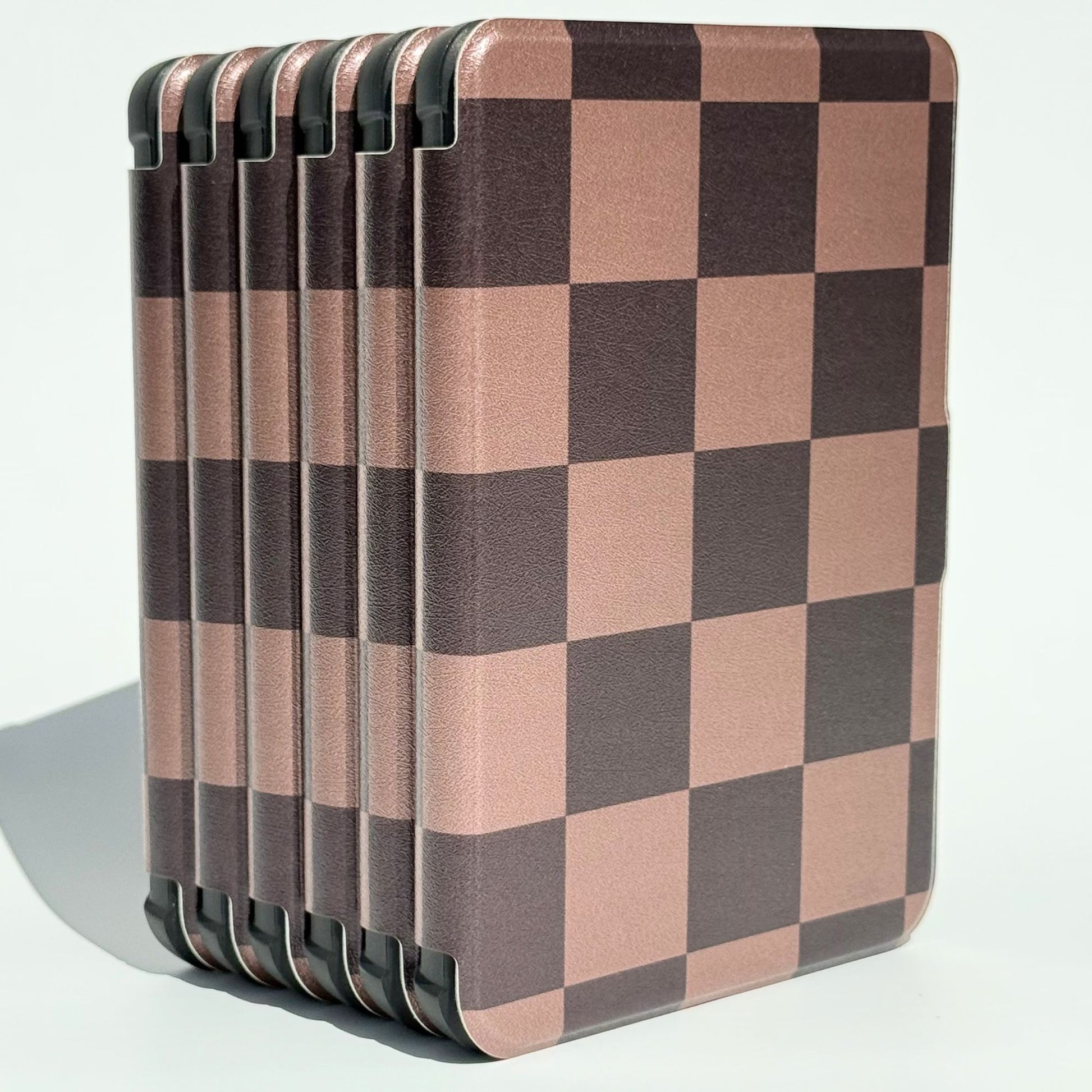 Angled side view of The Dreamer Kobo Libra cases showing shockproof black bumper and brown checker print