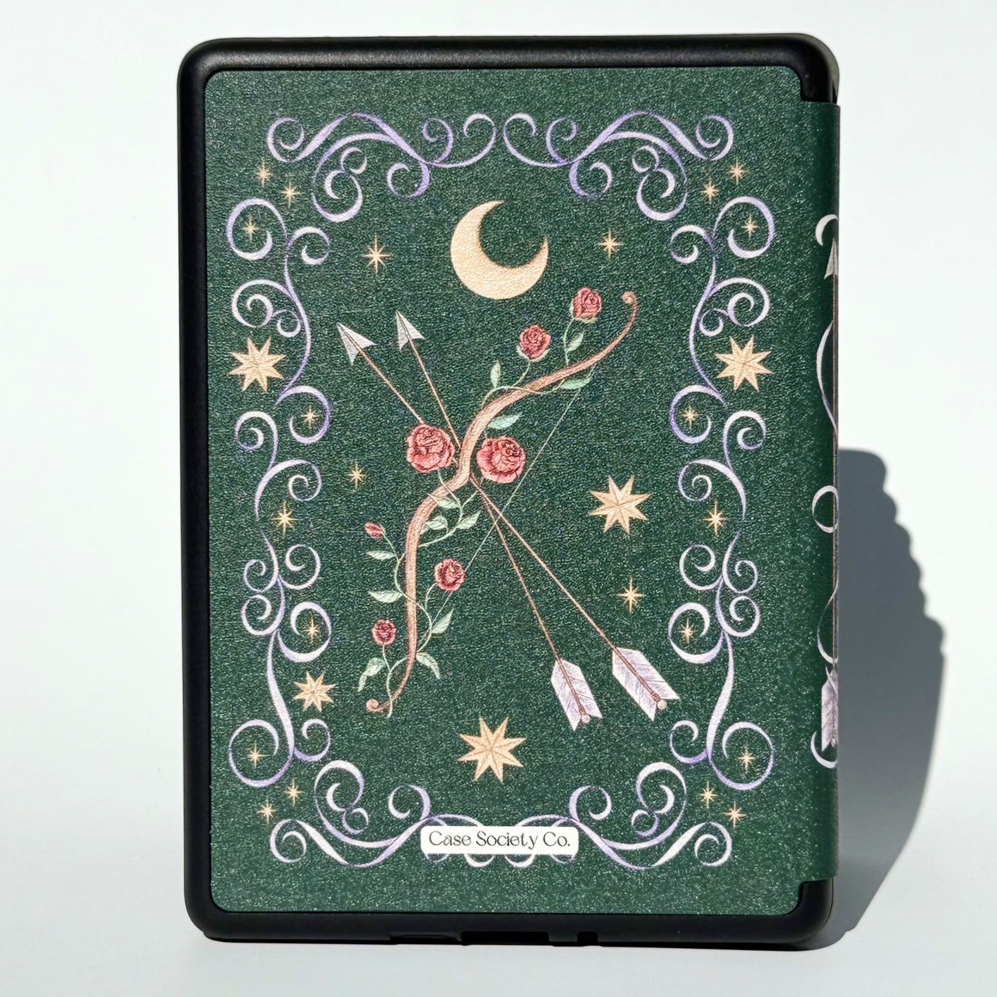 Three The Huntress green romantasy Kindle cases fanned out, bow and roses design