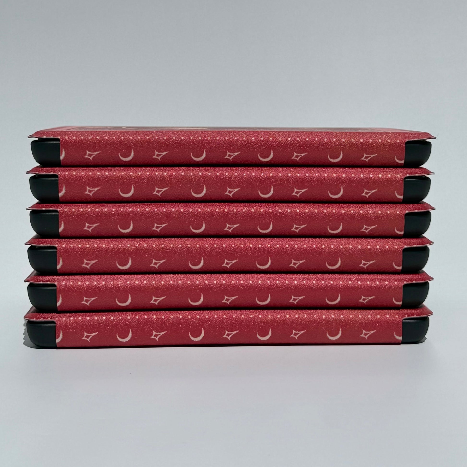 Stack of The Lovers Kindle cases at an angle showing reinforced protective corners — aesthetic Kindle case AU
