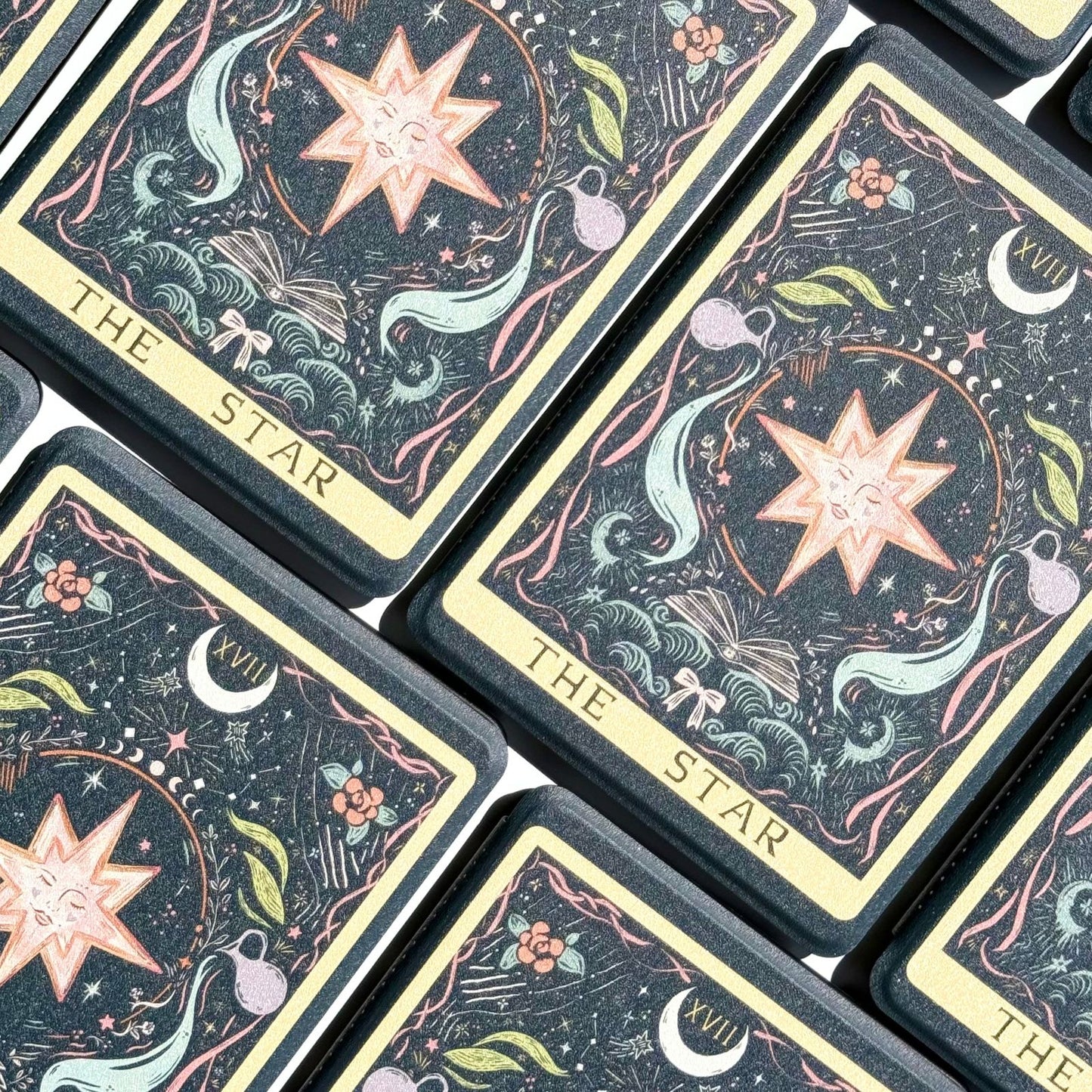 A grid of Case Society Kindle cases, each cover printed with The Star tarot design