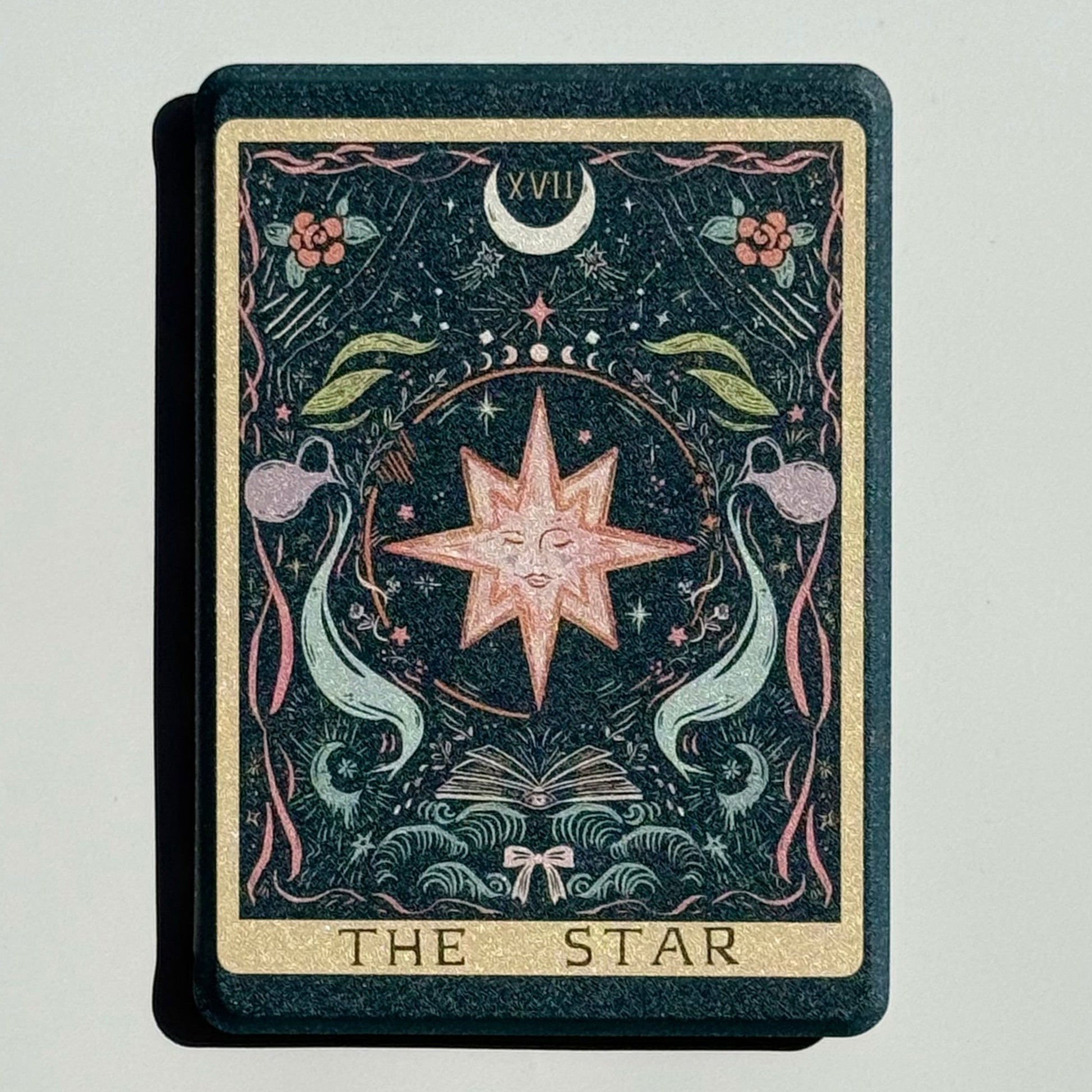 The Star Kindle case flat in the sun, the full tarot card from gold border to THE STAR title