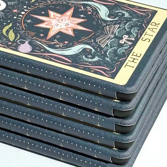 The Star tarot card cover in celestial gold, rose and dusty blue on a Case Society Kindle case