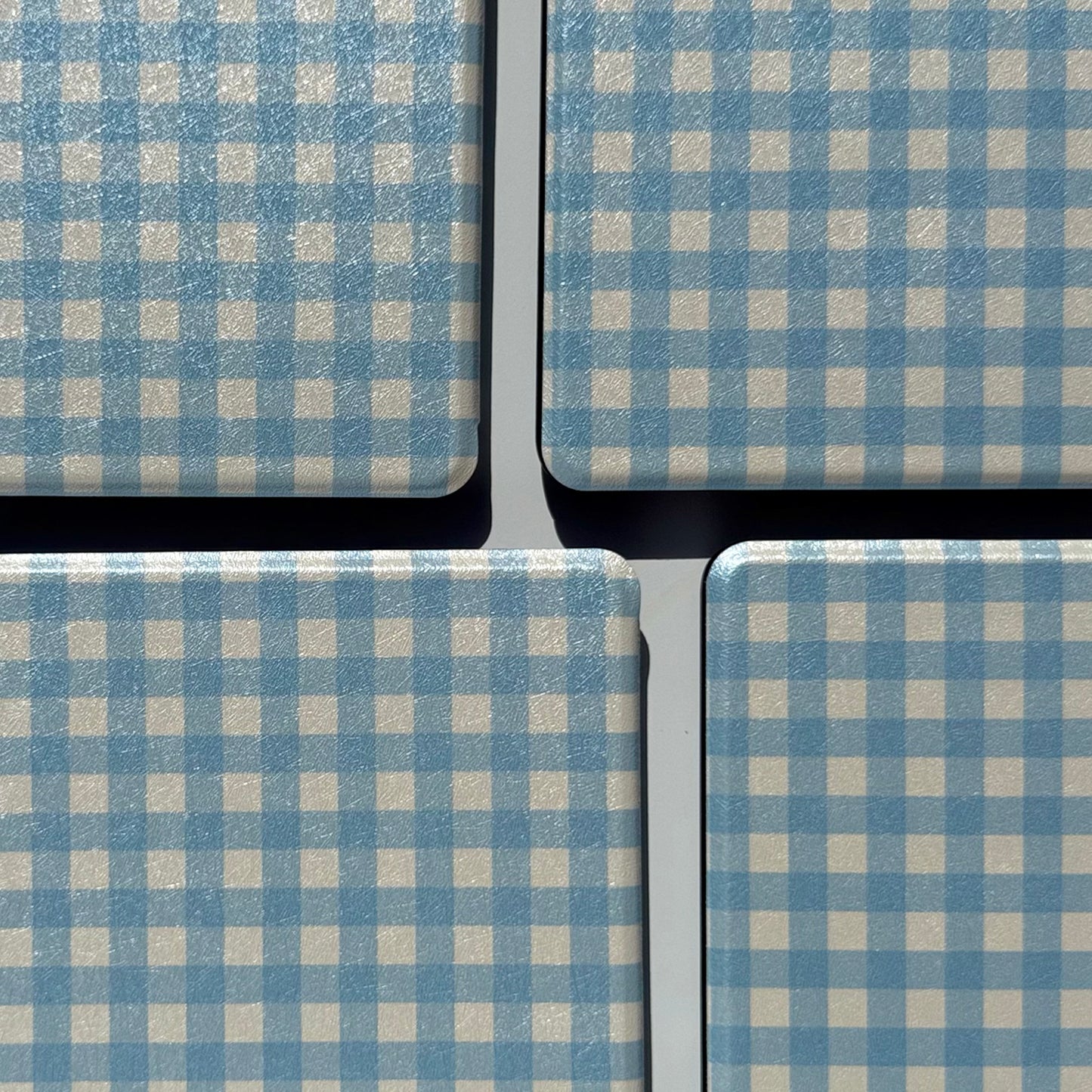 Leather kindle case with blue and white gingham pattern 
