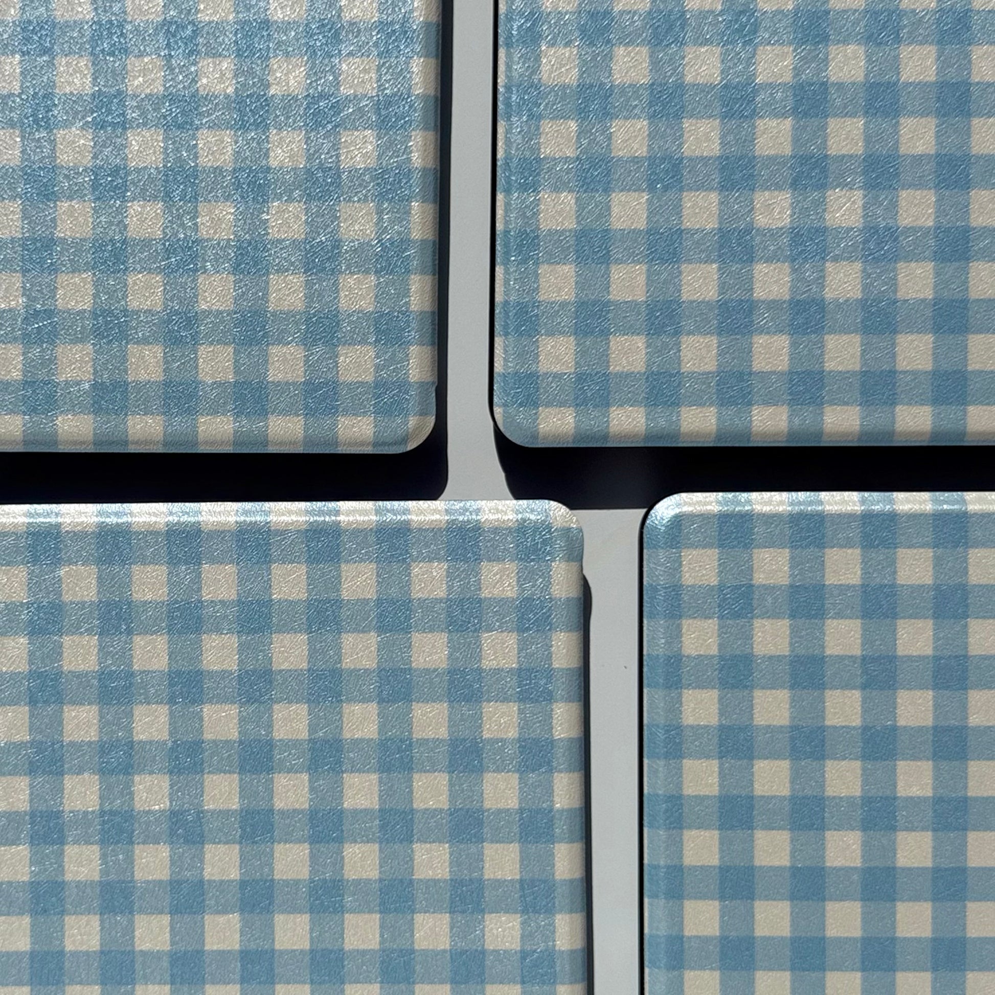 Leather kindle case with blue and white gingham pattern 
