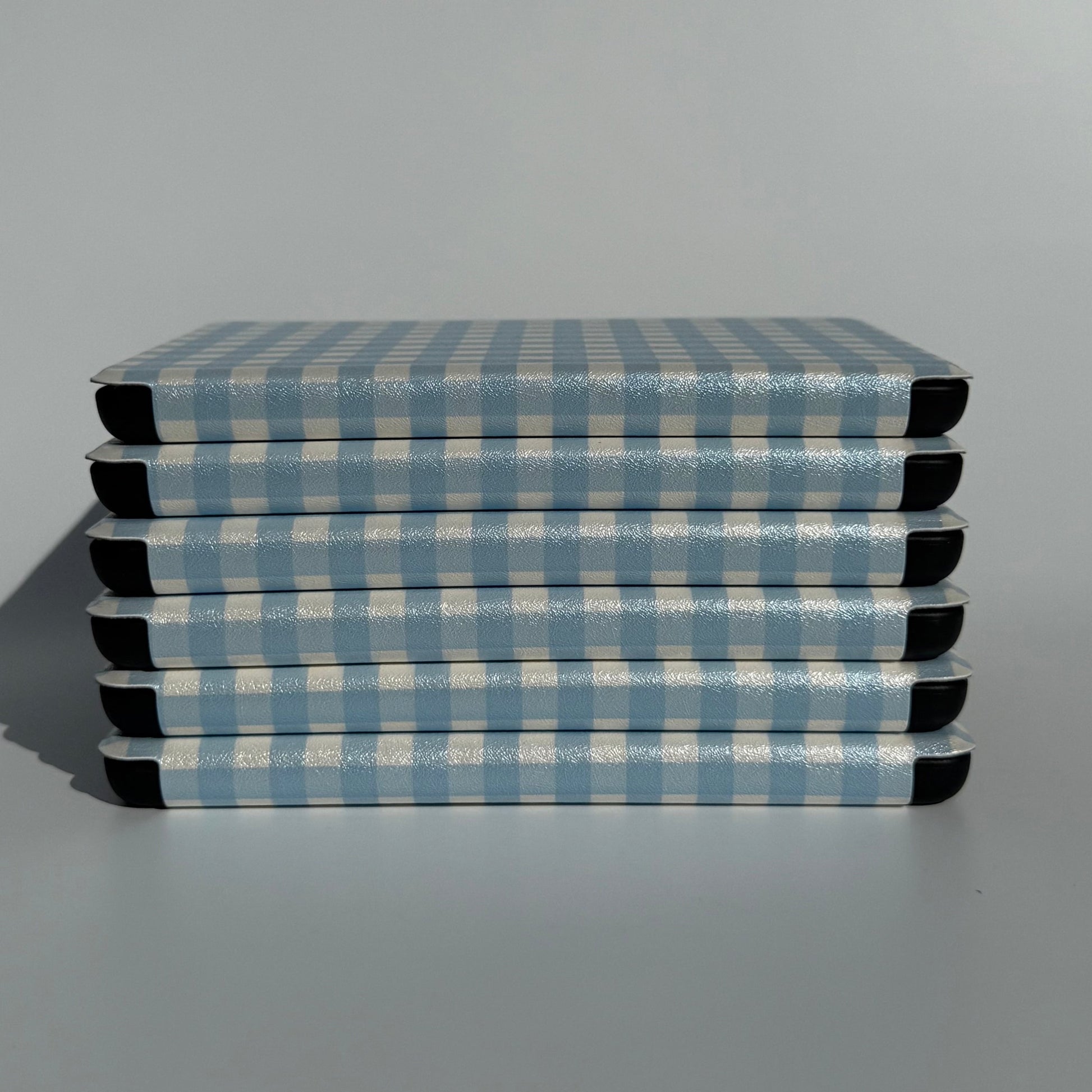 The Quiet Blue blue gingham Kindle cases with hand strap and magnets