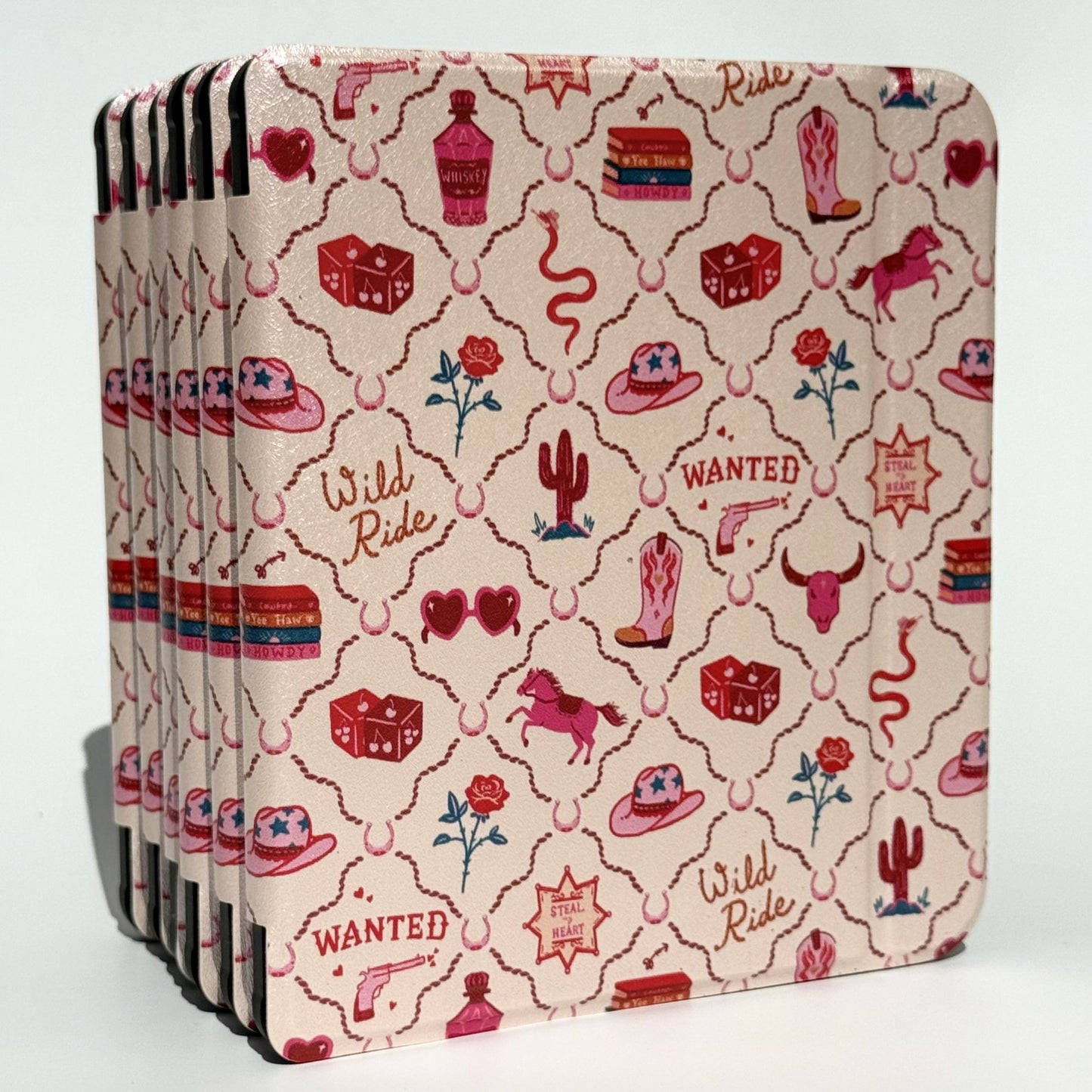 Back of Wild Ride Kobo Libra case showing precise camera cutout, black shockproof bumper and Case Society Co. logo on pink coastal cowgirl print